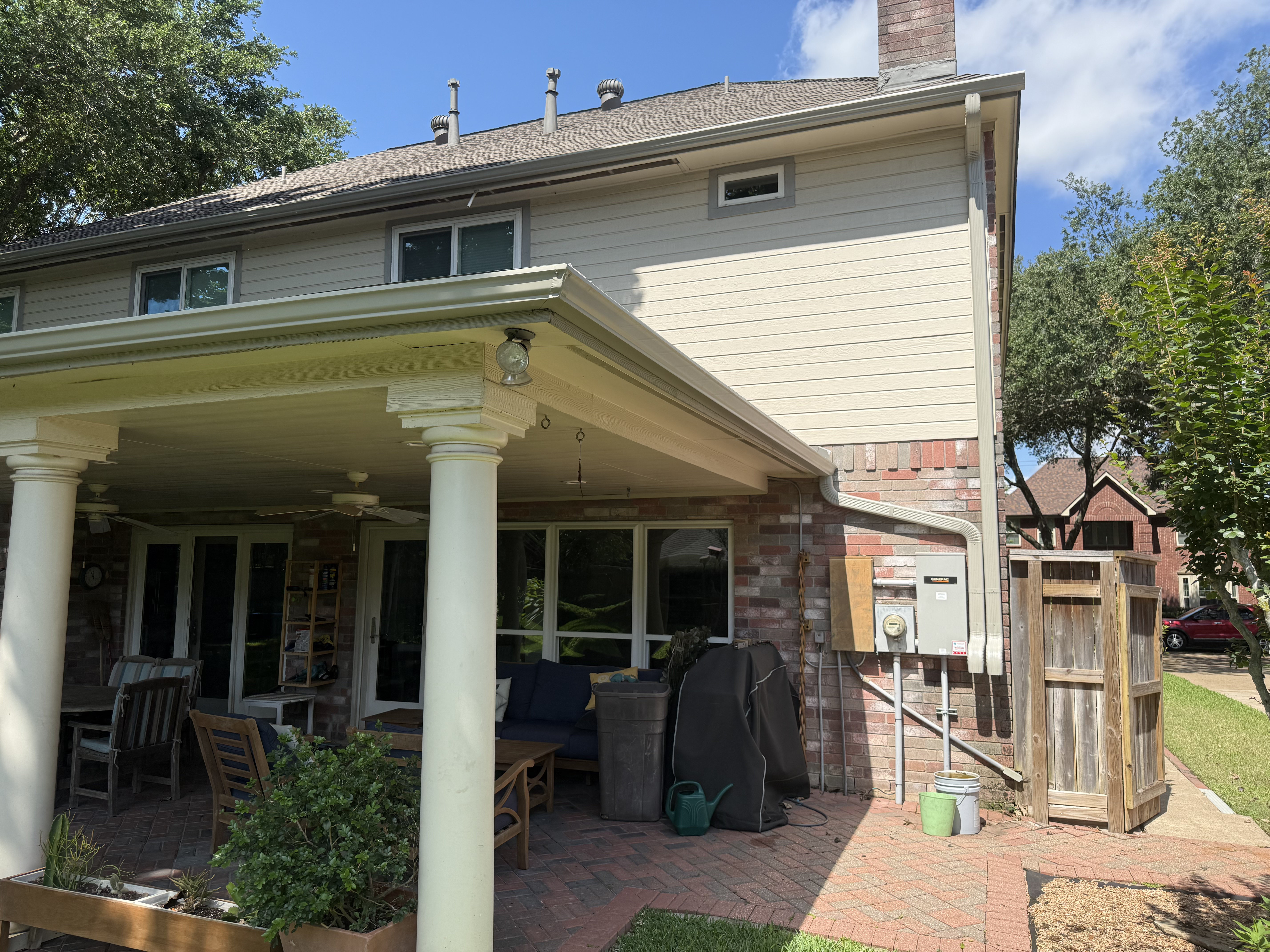 Completed exterior painting on home with covered patio