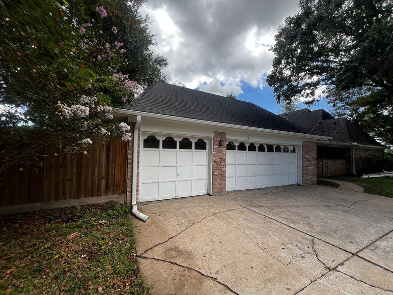 White seamless gutters on a single-story ranch home